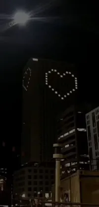 building with heart shaped lights wallpaperTikTok Search