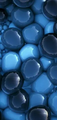 This live phone wallpaper features a blue pebble close-up in nanomaterial background