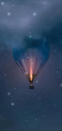 This stunning live wallpaper features a digitally created image of a hot air balloon gracefully floating through a dark, starry night sky