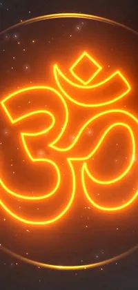 This live wallpaper features a glowing orange Om symbol on a black background