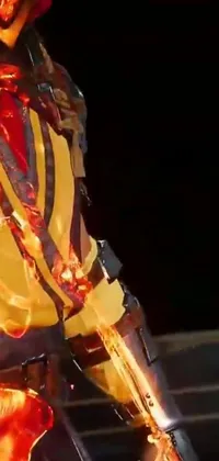 This stunning phone live wallpaper depicts a costume with a fiery molten effect