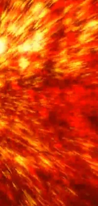 This live wallpaper showcases a close-up view of a fiery red and yellow star resembling a sci-fi screenshot from an iconic anime