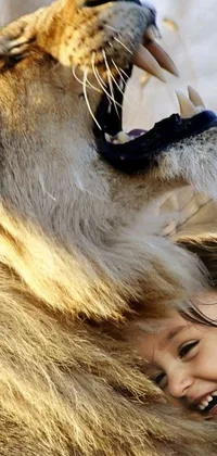 This live phone wallpaper depicts a stunning image of a young girl embracing a massive lion, creating a striking scene of love and connection