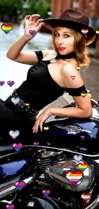 This mobile live wallpaper features a realistic photo of a confident redheaded woman sitting on the back of a motorcycle, wearing a stylish black dress and hat