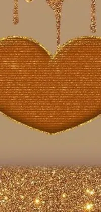 This stunning live wallpaper for your phone features a beautiful gold glitter frame with a heart hanging from it, creating a romantic and charming design