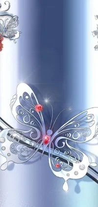 Get mesmerized by this amazing phone live wallpaper featuring a stunning blue and silver background adorned with exquisite roses and a beautiful butterfly