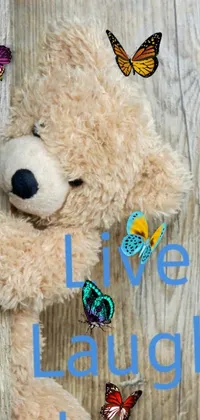 Get the cutest phone wallpaper ever with our live teddy bear wallpaper! Featuring a simple yet heartwarming message, the bear holds up a sign that says "live laugh laugh laugh laugh laugh laugh laugh laugh laugh laugh laugh laugh laugh laugh laugh laugh laugh laugh laugh laugh