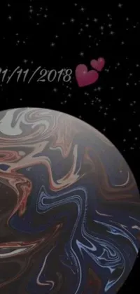Add a touch of planetary charm to your phone with this stunningly designed live wallpaper! It features a colorful planet icon with a heart front and center, surrounded by a bright and mesmerizing marble design