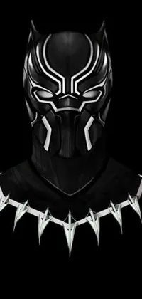 This live phone wallpaper offers a dramatic close-up of a black panther mask in vector art style