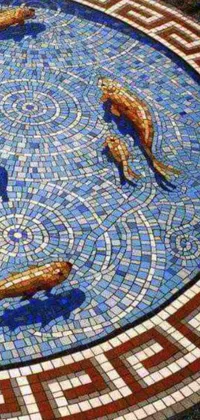 This realistic and mesmerizing live wallpaper features a circular pool of fish created in a captivating mosaic style