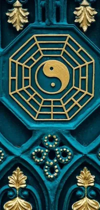 This captivating phone live wallpaper features a green and gold door adorned with a yin symbol