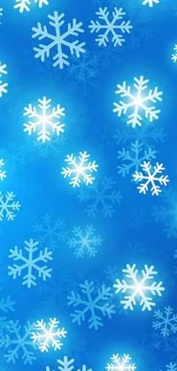 This live wallpaper features a stunning pattern of snowflakes on a blue background