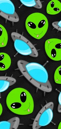This live wallpaper features green alien faces in a modern vector art style