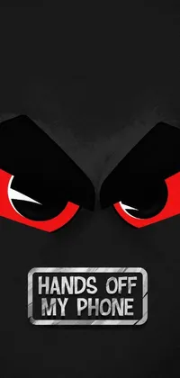 Looking for an edgy and eye-catching live wallpaper for your Android device? Check out this stunning design featuring a menacing black backdrop, fiery red eyes, and a bold "Hands Off My Phone" message