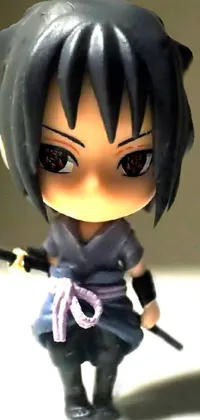 Looking for a stunning live wallpaper that's both cute and badass? Check out this design featuring a figurine of a person with a sword, a panoramic centered view of a girl, and an image of Sasuke Uchiha! With beautiful colors, intricate details, and plenty of style, this wallpaper is sure to make your phone stand out from the crowd