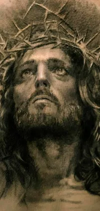 This phone live wallpaper features a breathtaking charcoal drawing of Jesus on cross with a crown of thorns on his head