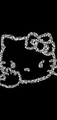 This live wallpaper depicts a black background with a stylish Hello Kitty necklace, rendered in modern digital detail and augmented with an ASCII art effect for added charm
