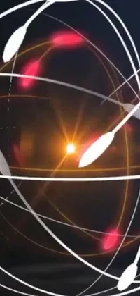 This phone live wallpaper features a spinning light around a sphere with thick wires and multiple suns in the background