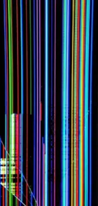 Enjoy a stunning phone live wallpaper that showcases multicolored lights moving in a dark room