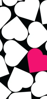 This pink heart live wallpaper features a playful pattern of white hearts against a black background