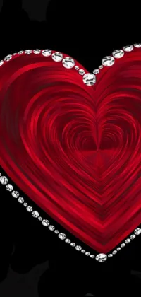 This phone live wallpaper features a stunning red heart embedded with diamonds, set against a black background