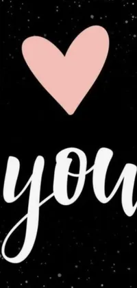 Looking for a chic and stylish live wallpaper to jazz up your phone? Look no further than this classy black background with a beautiful pink heart and the word "you" in bold font
