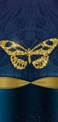 Looking for a phone live wallpaper that adds a touch of elegance to your device? Look no further than this blue and gold background, featuring a beautiful butterfly and gold linens