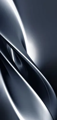 This live phone wallpaper features a close-up shot of a metal object inspired by contemporary architecture, with soft curves and glossy skin on a grey background