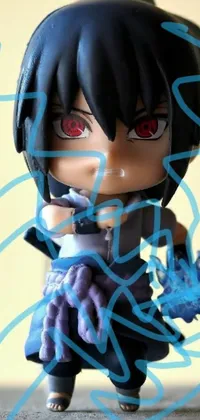 Enchant your phone screen with a fiery chibi wallpaper! This <a href="/">animated phone wallpaper</a> depicts a toy figure with blue flame powers, who is pointing at the viewer with an angry expression