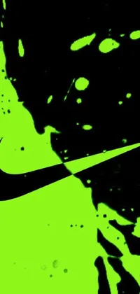 This action-packed phone live wallpaper features a bright green tennis ball surrounded by black background, with the iconic white "Nike" logo written across the screen