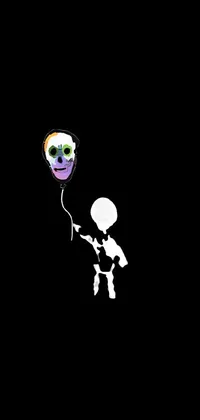This phone live wallpaper features a spooky yet captivating image of a skeleton holding a colorful balloon in the dark