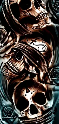 This gothic phone live wallpaper showcases a pair of skulls adorned with tribal tattoos on their right arms, set in a digital art style