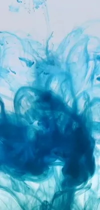 This live wallpaper for your phone showcases a stunning blue substance swirled in water, inspired by abstract expressionist art