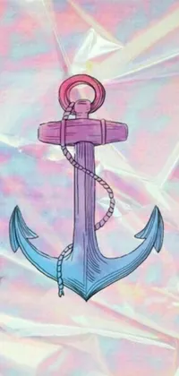 This phone live wallpaper showcases a pink and blue anchor on top of a foil background