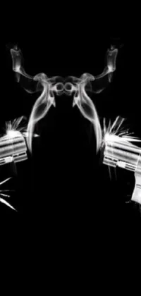 This phone live wallpaper depicts two revolvers surrounded by smoke in high definition with 8k resolution and grainy black and white footage effect