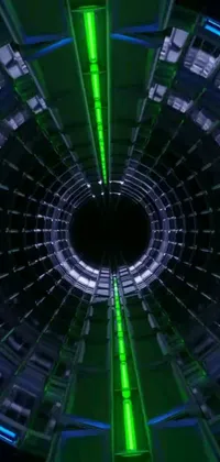 This phone live wallpaper features a remarkable circular tunnel lit with green and blue lights, creating a stunning digital rendition perfect for sci-fi enthusiasts and tech-savvy individuals