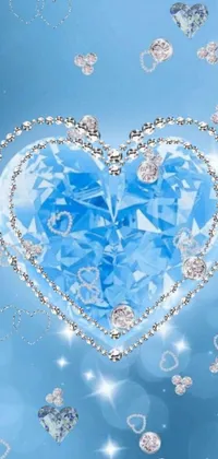 This stunning live phone wallpaper features a beautiful blue heart adorned with sparkling diamonds on a calming blue background