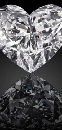 This phone live wallpaper showcases a stunning heart-shaped diamond on a sleek black background