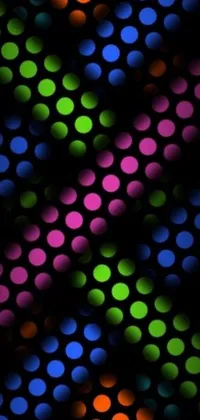 Transform your phone's appearance with this stunning live wallpaper that features a cluster of multicolored lights arranged in an intricate pattern against a black background
