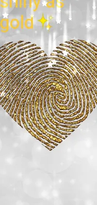 Enhance your phone's aesthetic with this stunning golden fingerprint in the shape of a heart live wallpaper