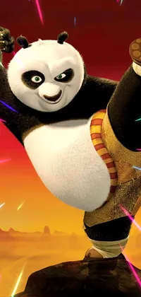 This phone live wallpaper features a cute cartoon panda performing a kick on a rock
