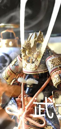 Upgrade your phone's home screen with this stunning live wallpaper featuring a close up of a samurai figurine