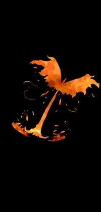 This phone live wallpaper showcases a vibrant orange fire-colored palm tree against a stunning black background