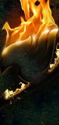 This phone live wallpaper displays a detailed close-up of a burning object with a distinctive metal tail on a dark background