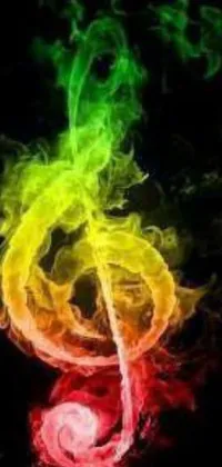 Enjoy a stunning live wallpaper for your phone that features a multicolored treble symbol displayed on a black background, surrounded by striking smoke and fire elements