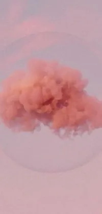 This phone live wallpaper boasts a beautiful pink cloud set against a vivid blue sky, surrounded by a hazy mist and set against a bubblegum color scheme