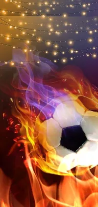 This lively and vibrant phone live wallpaper features a soccer ball with bright bursts of fire emanating from it