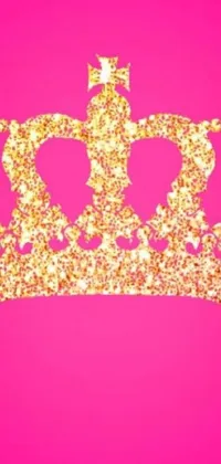 This lively phone wallpaper showcases a regal gold crown set against a bright pink backdrop