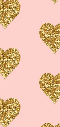 This phone live wallpaper showcases a beautiful seamless pattern design in shades of pink with sparkling gold glitter hearts