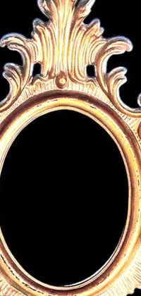 This phone live wallpaper features a baroque-style, gold picture frame on a deep black background